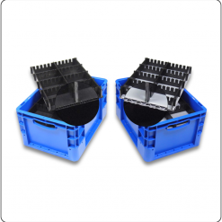 Kunststoff-KLT mit eingelegten Zwischenlagen und Trenn-Zahnleisten zur strukturierten Bauteilorganisation in Lager, Logistik und Produktion.